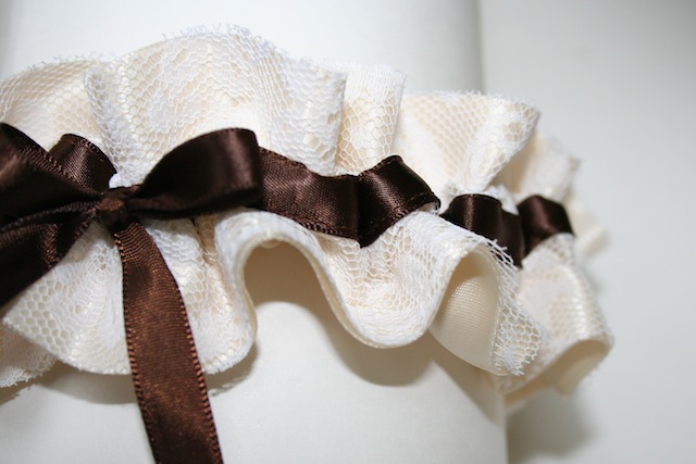 Here is a wedding garter made from the bride's mother's wedding dress that I