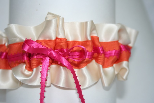 orange grosgrain stripe and a hot pink feathered satin bow 2 inches 