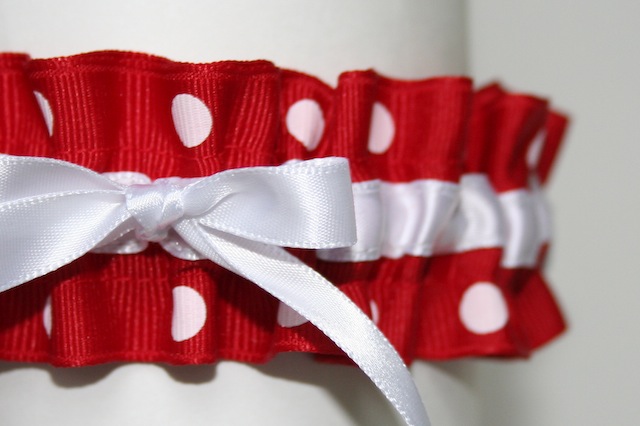 this stylish wedding garter design is red and white polka dot grosgrain with