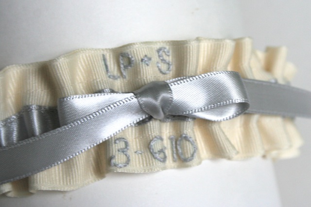 This custom wedding garter is ivory grosgrain with a silver satin bow 15 