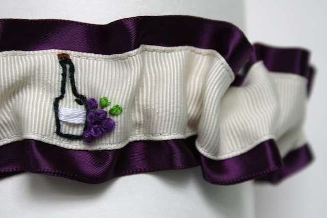 wine themed hand embroidered deep purple and ivory wedding garter by the